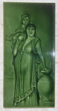 Uncommon pair of Spanish Ladies feature tiles with sword and amphora pot. Wade, England is the likely maker, circa 1890. 6x12 inch tiles, emaux ombrants moulded tiles in mid green glaze, (WS) $240 for the pair. salvaged, recycled, demolition, reproduction, restoration, home renovation secondhand, used , original, old, reclaimed, heritage, antique, victorian, art nouveau edwardian, georgian, art deco