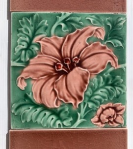 Aesthetic period c1900 moulded feature tiles, bold flower design in dusky pink and green glaze. Two panel fireplace set $375 (OTB322) salvaged vintage recycled, demolition, reproduction, restoration, home renovation secondhand, used , original, old, reclaimed, heritage, antique, victorian, art nouveau edwardian georgian art deco