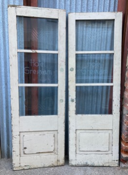 Original glass and timber swing doors, ex Gresham Hotel with curved edges, some glass panels have been replaced- maybe these were in the way of a couple of heads or fists in their past :) 2250mm H x 1550mm W (D160) $545 salvaged vintage recycled, demolition, reproduction, restoration, home renovation secondhand, used , original, old, reclaimed, heritage, antique, victorian, art nouveau edwardian georgian art deco