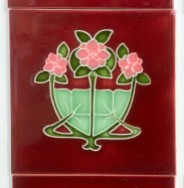 detail of Reproduction Art Nouveau feature tiles, Porteous NZ. rich burgundy background with trio of pink flowers with foliage. Two panel fireplace tile set, $200 (OTB327) salvaged, recycled, demolition, reproduction, restoration, home renovation secondhand, used , original, old, reclaimed, heritage, antique, victorian, art nouveau edwardian, georgian, art deco