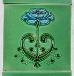 salvaged vintage recycled, demolition, reproduction, restoration, home renovation secondhand, used , original, old, reclaimed, heritage, antique, victorian, art nouveau edwardian georgian art deco Detail of Alfred Meakin & Co, England mould flower feature tiles. Blue petals with green. Design regd in 1884. Green 3 x 6 inch spacer tiles show wear. (SET516) $170 for the pair of fireplace panels