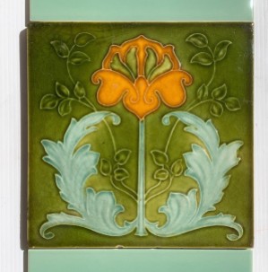 salvaged vintage recycled, demolition, reproduction, restoration, home renovation secondhand, used , original, old, reclaimed, heritage, antique, victorian, art nouveau edwardian georgian art deco Detail of rare Wade England feature tiles, circa 1910 Art Nouveau / Rococo flower in deep yellow and greens. Fireplace panel pair for $390 (OTB316)